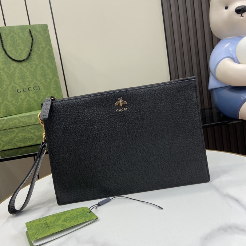G*u*i clutch bags
